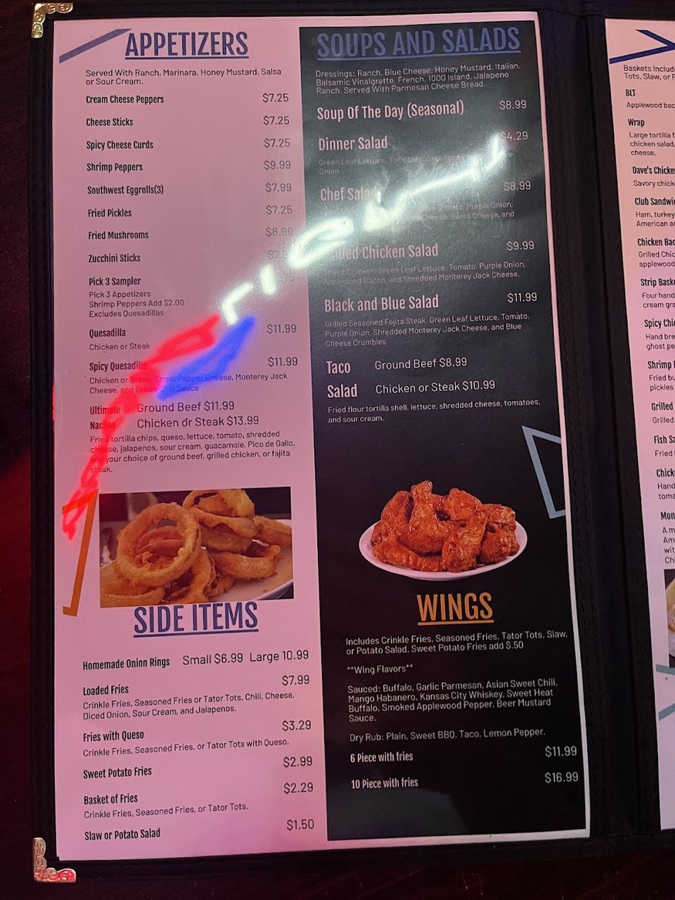 Restaurant menu listing burgers and chicken wings.